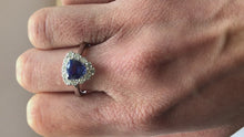 Load and play video in Gallery viewer, Diamond and Tanzanite Triangle White Gold Ring video