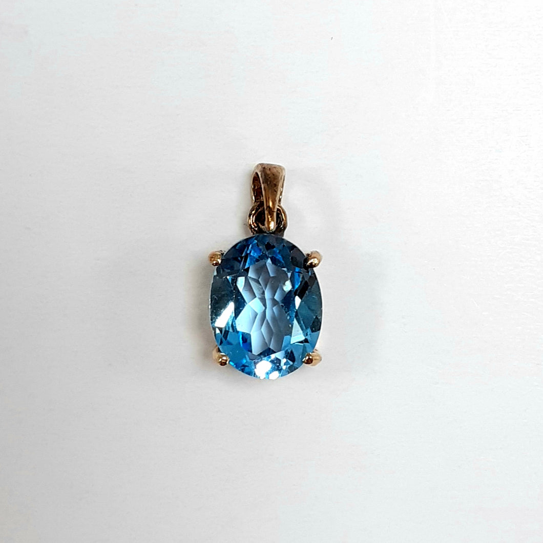 9ct Yellow Gold Blue Topaz Pendant - Product Code - F925